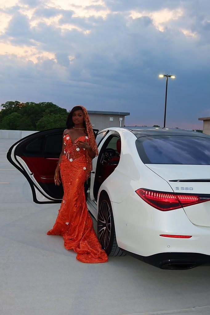 White Mercedes-Benz S 580 at a special-event arrival with the rear badge visible