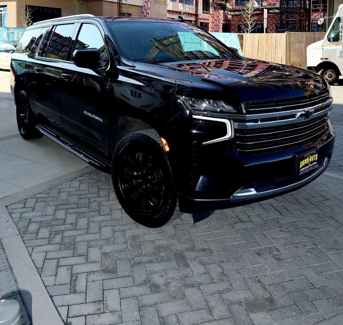 Black Chevrolet Suburban, low front angle